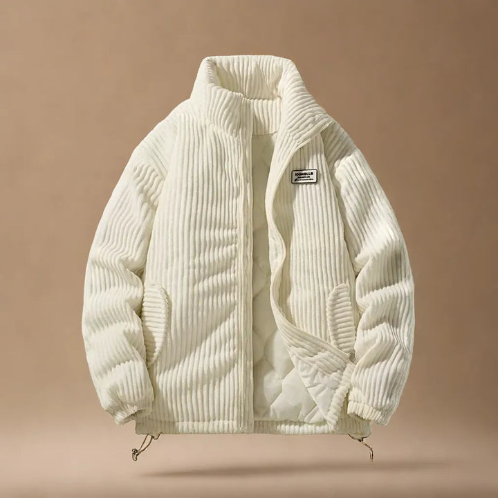 Detail of rugged men's alpine jacket's pocket & zipper. Functional, stylish long-sleeve outerwear for fall/winter.