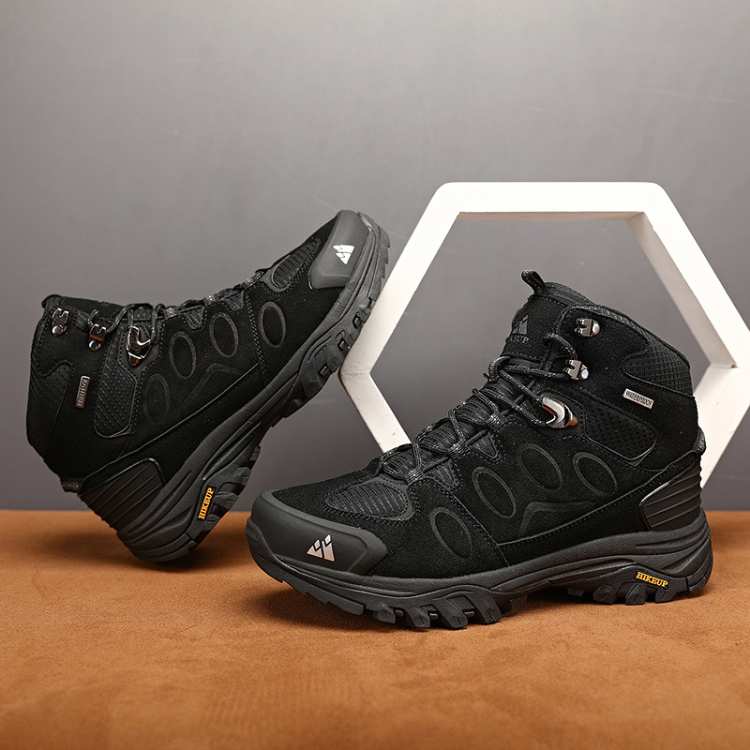 Close-up of the durable sole on men's all-terrain hiking boots, perfect for challenging trails.