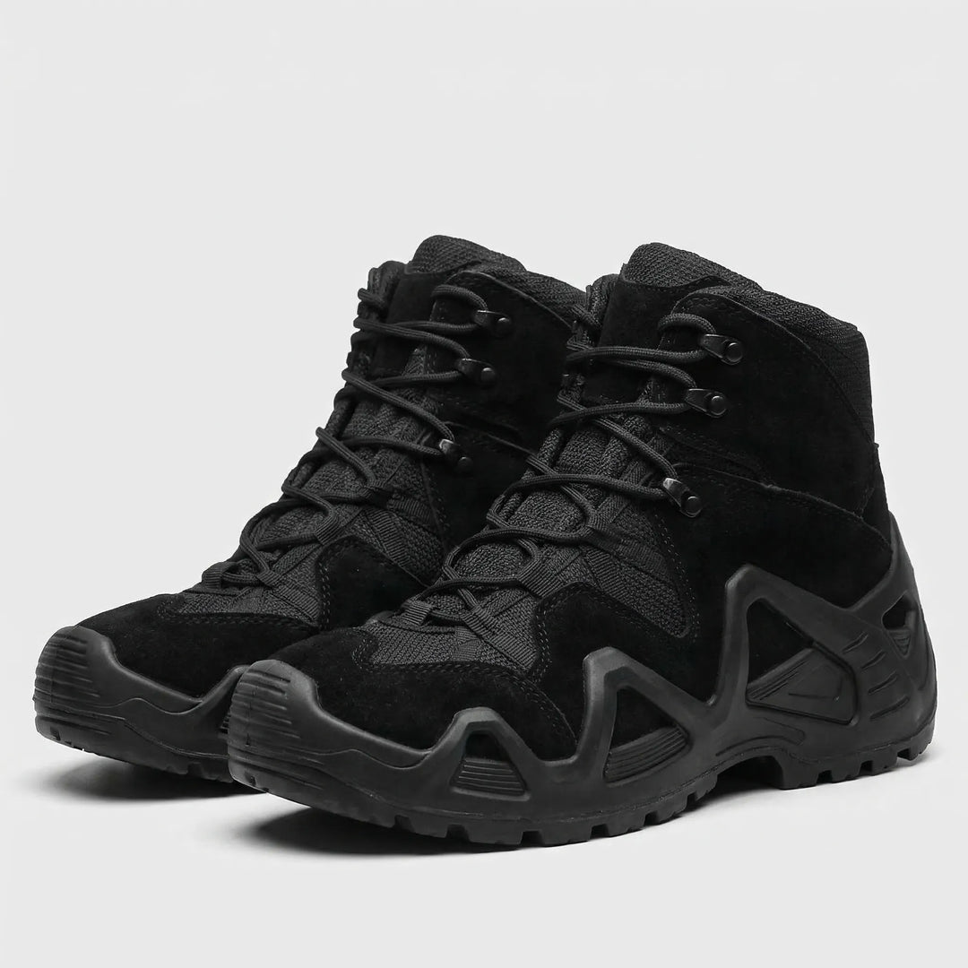 All-terrain men's hiking boots. Rugged mid-top design, durable & adventure-ready for cold weather.