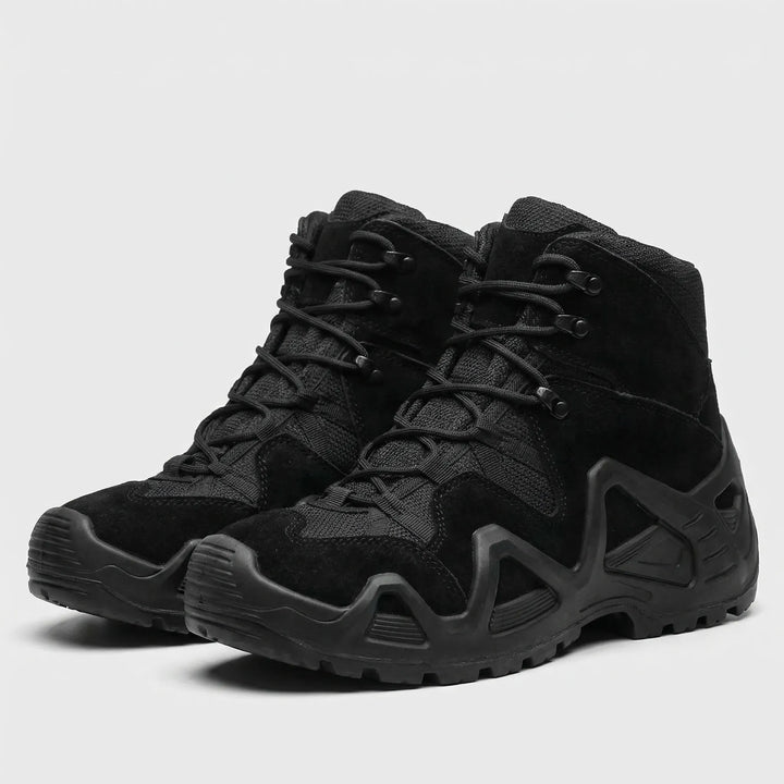 All-terrain men's hiking boots. Rugged mid-top design, durable & adventure-ready for cold weather.