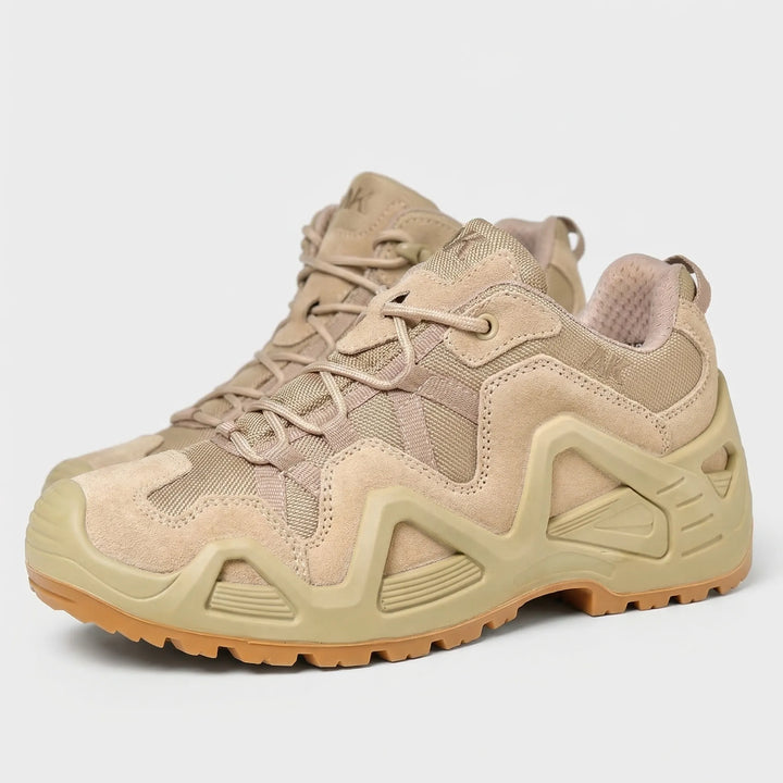 Cold weather men's rugged mid-top tactical hiking boots. Durable, all-terrain adventure footwear.
