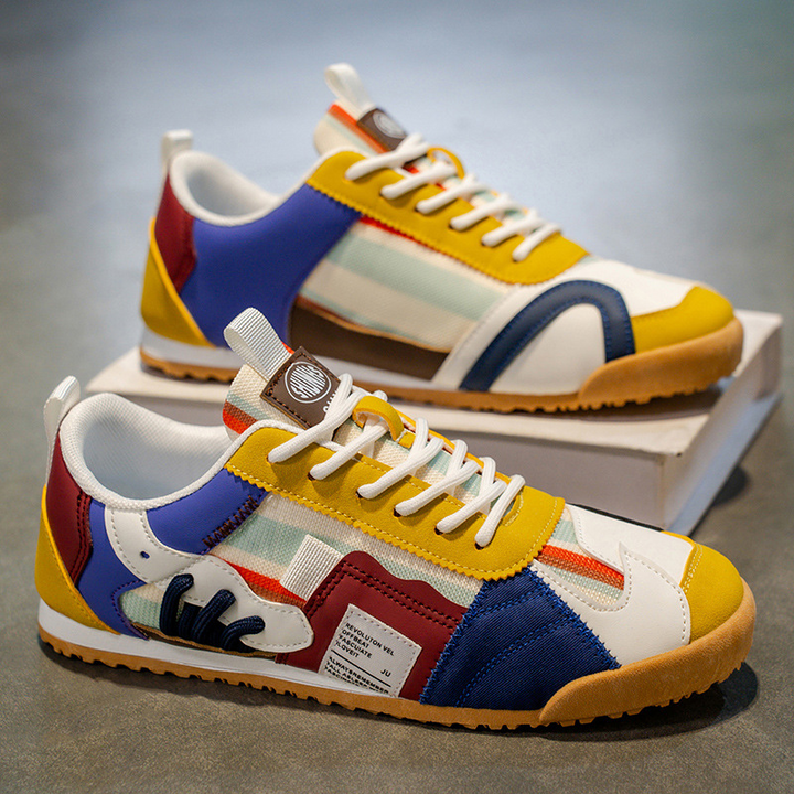 Stylish mens sneakers for urban adventures, boasting a durable construction and modern look.