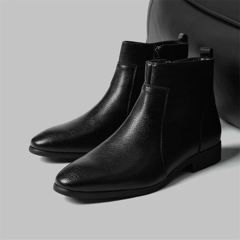 Men's fashion ankle boots: sleek silhouette, side zip, pointed toe for ultimate style.