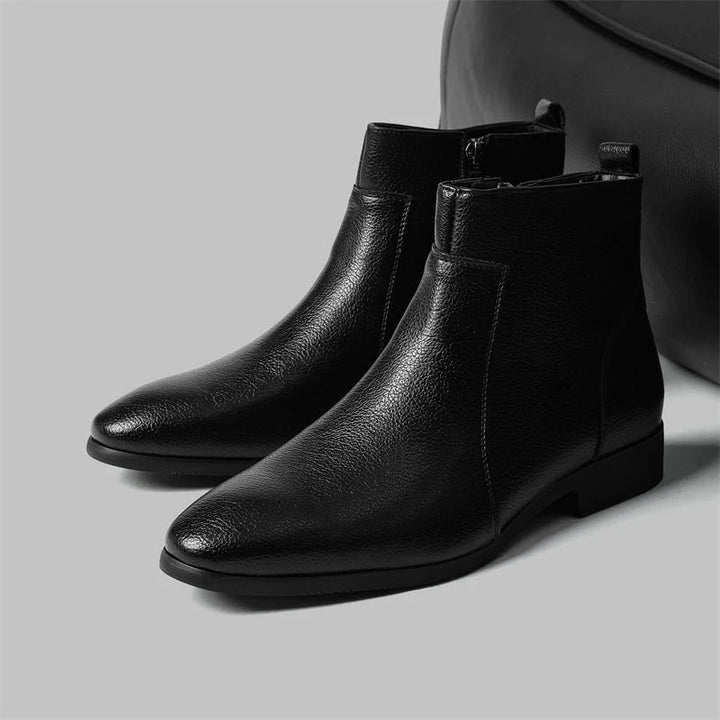 Men's fashion ankle boots: sleek silhouette, side zip, pointed toe for ultimate style.