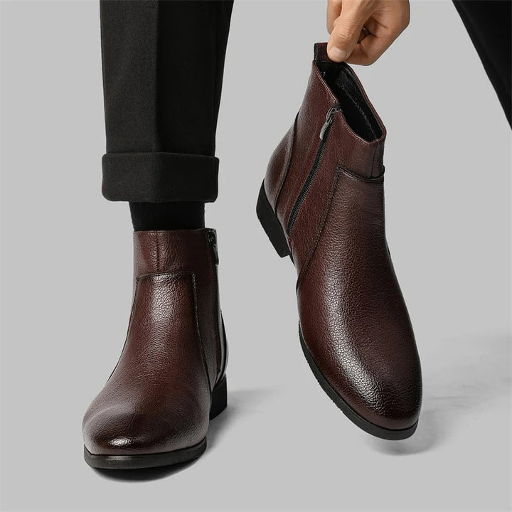 Fashion-forward men's zip ankle boots, sleek profile, ideal for versatile styling.