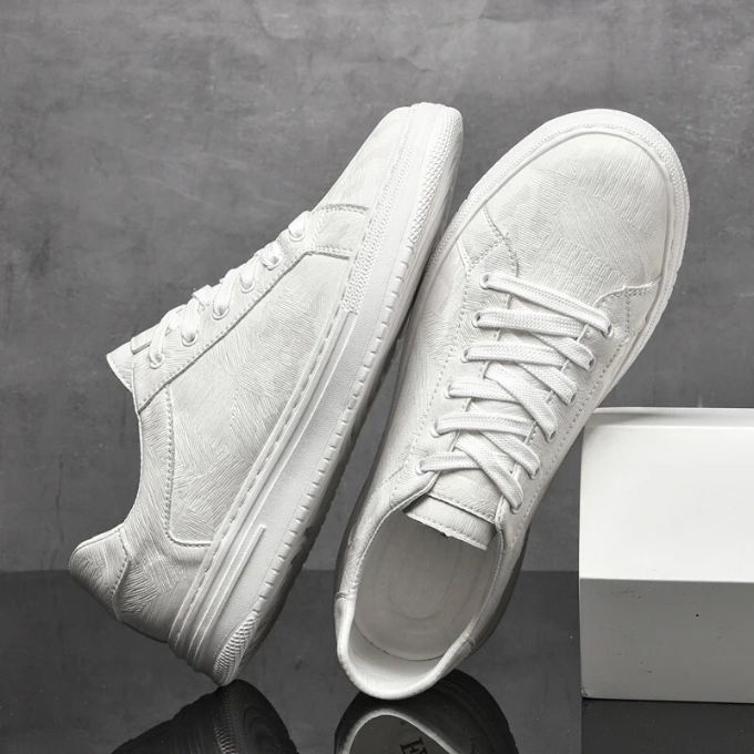 Comfortable sand men's sleek everyday sneakers, low-top casual footwear for daily use.