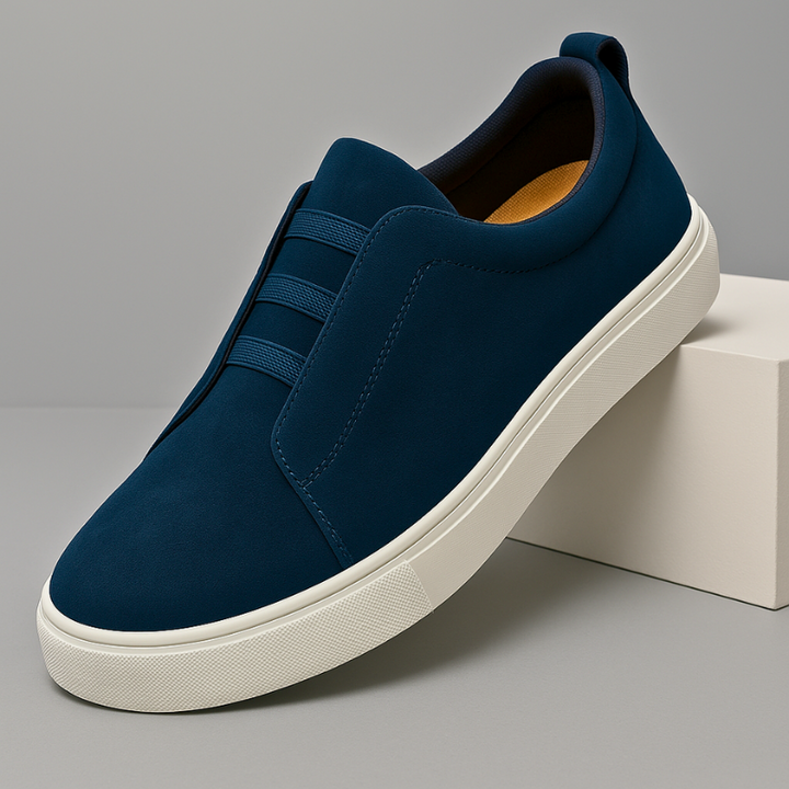 Men's sleek navy blue slip-on Chelsea sneakers, perfect for casual daily wear & stylish comfort.