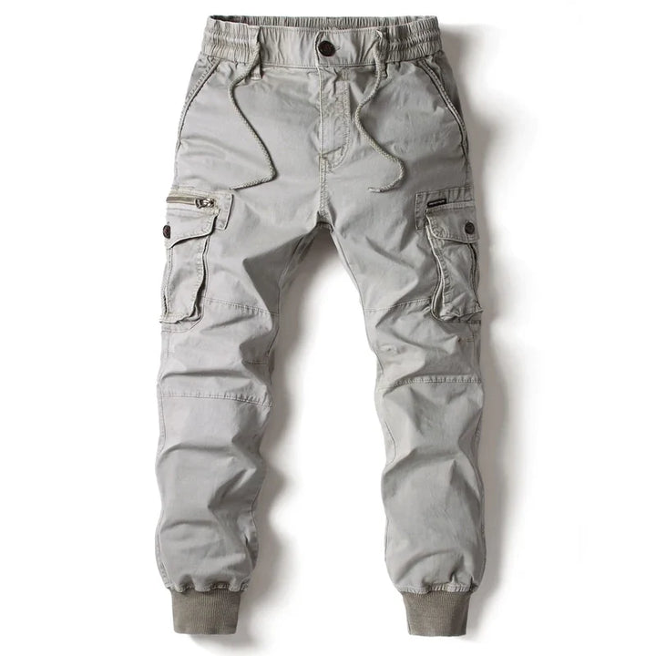 Modern men's black slim fit cargo pants. Versatile utility pants for casual wear, urban fashion, and comfortable outdoor style.