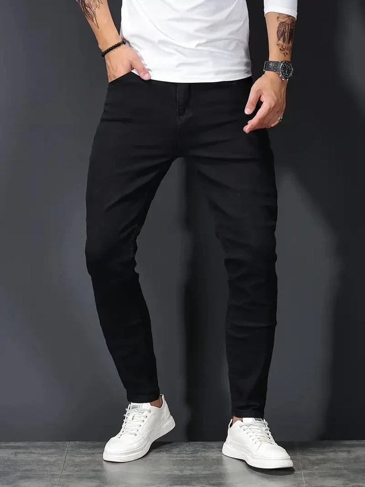 Comfortable & flexible men's slim fit jeans, modern design perfect for active everyday wear. Casual pants.