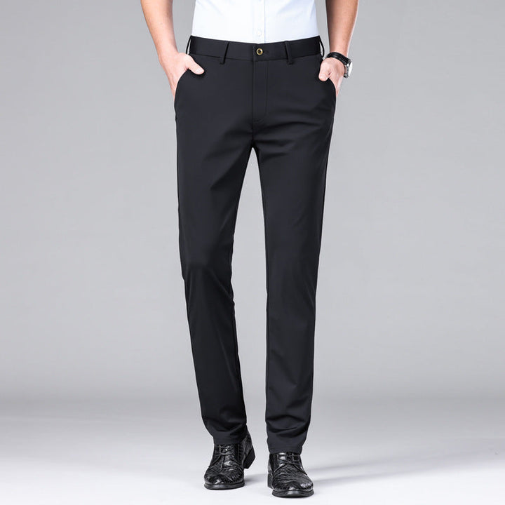 Active men's slim fit performance pants. Breathable stretch fabric for movement & all-day comfort.
