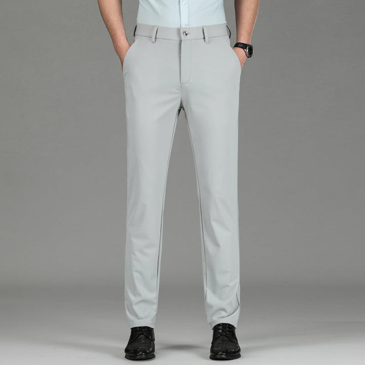 Sleek army green men's slim fit trousers. Performance fabric with moisture-wicking and stretch benefits.