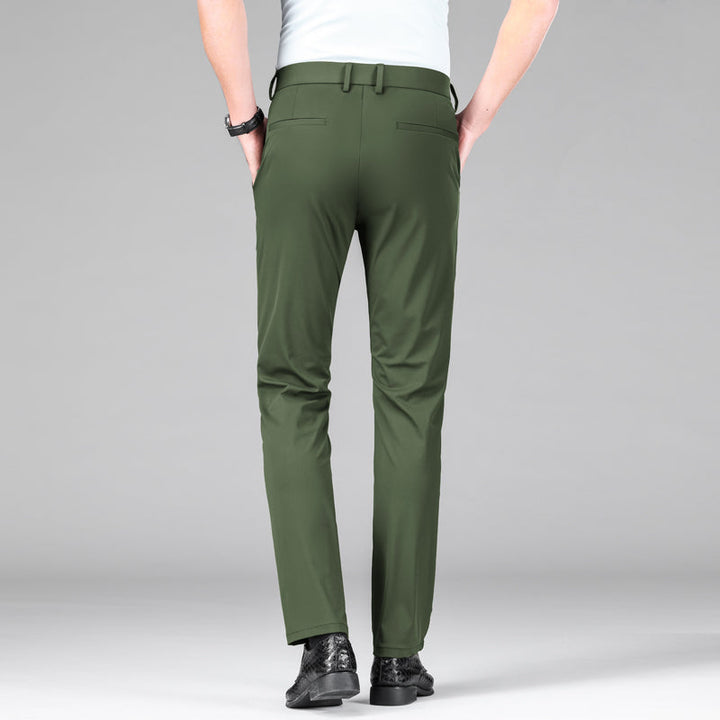Gray slim fit men's performance pants. Stretch fabric ideal for business, casual, or active lifestyles.