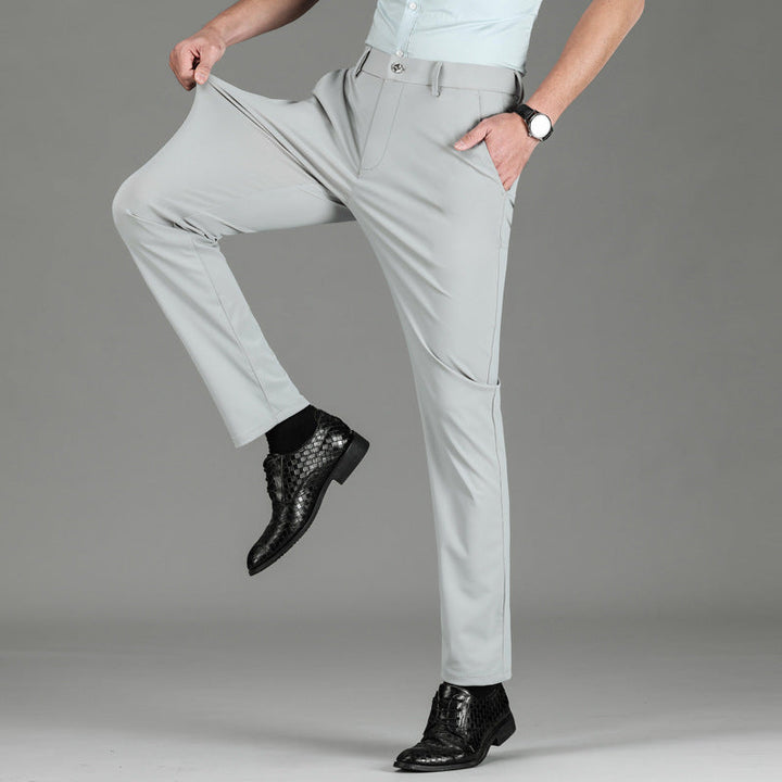 Performance men's work pants, slim fit design. Breathable, quick-dry fabric in a versatile black color.