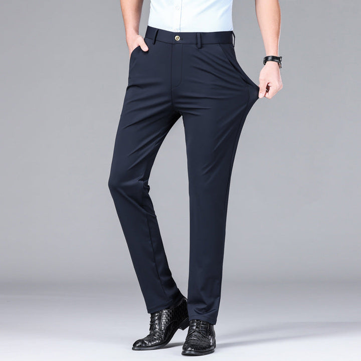 Travel-friendly men's slim fit trousers. Lightweight, stretch, moisture-wicking navy pants for comfort.