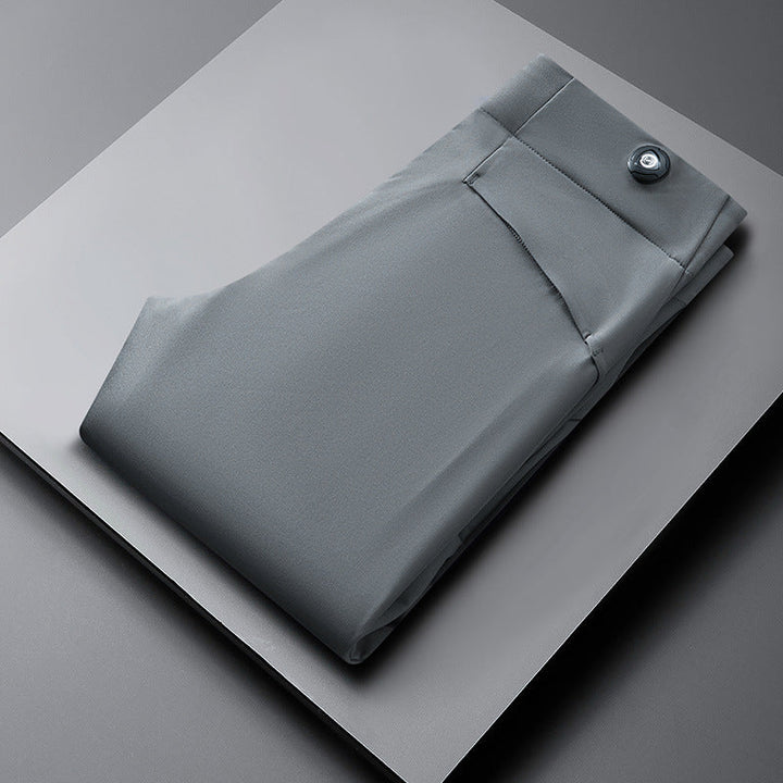 Men's slim fit performance pants in modern style, perfect for smart casual or versatile wear.