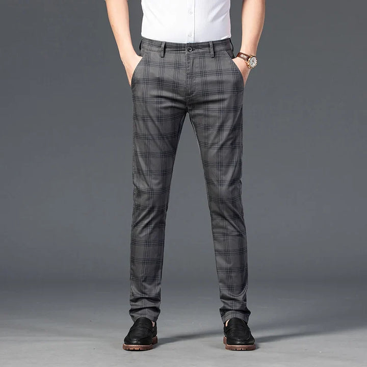 Versatile men's slim fit plaid trousers, suitable for office wear or smart casual events.