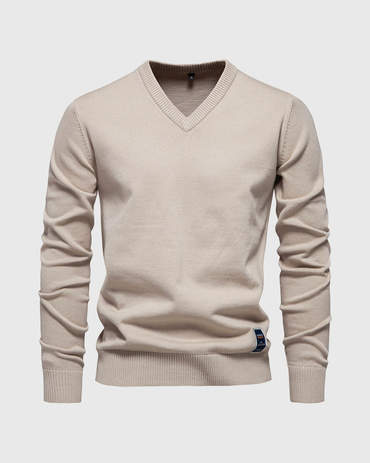 Comfortable men's long sleeve V-neck pullover with stylish ribbed texture, perfect for layering.