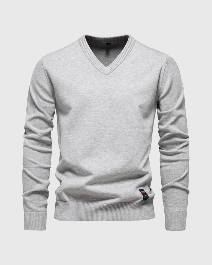 Stylish men's slim fit ribbed V-neck sweater for modern casual fashion, sleek look.