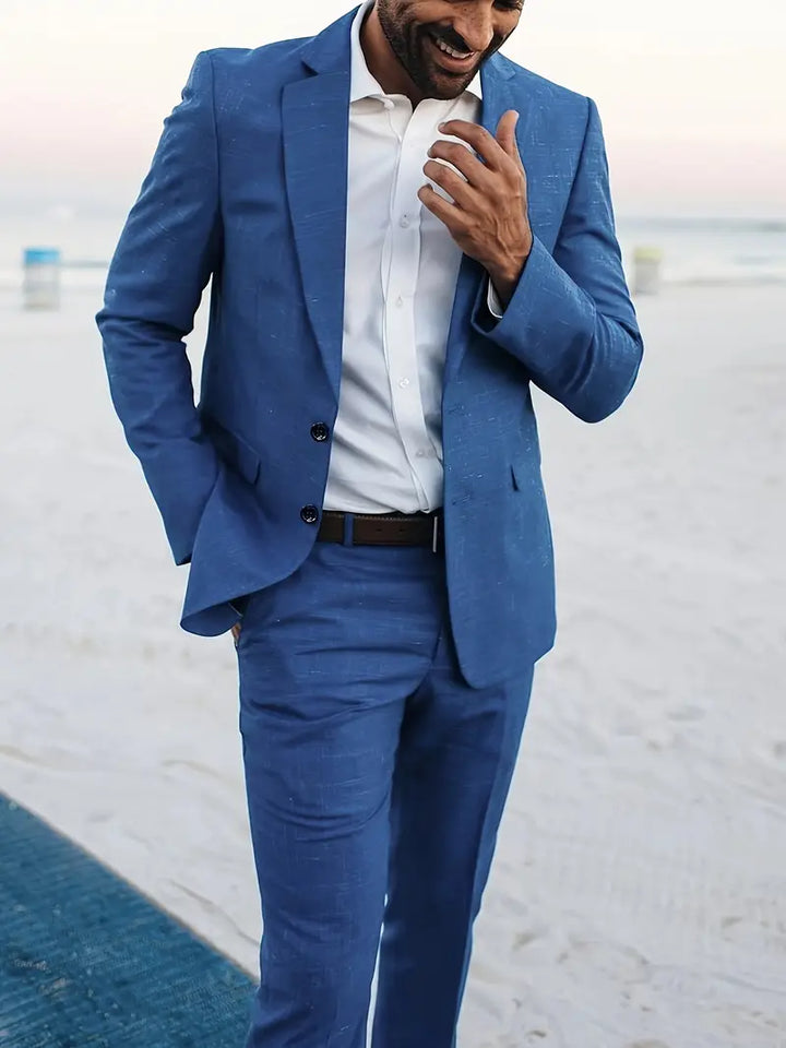 Blue men's slim fit suit set, a stylish two-piece blazer & trousers for business, weddings & special occasions.