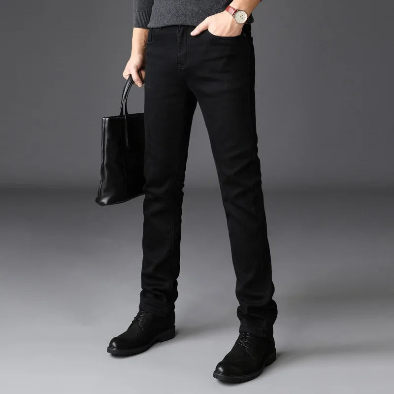 Men's modern slim-fit tapered jeans. Stylish and comfortable performance denim for everyday wear.