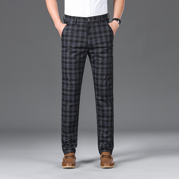 Men's sophisticated check trousers, tailored cotton blend for modern style.