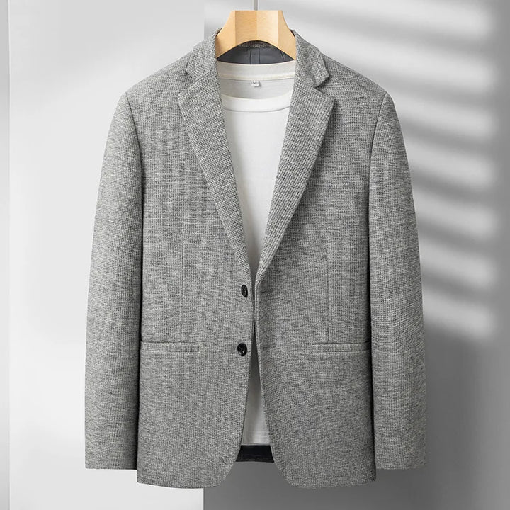Men's sophisticated tailored blazer, perfect for smart business casual or formal wear, exuding modern style.