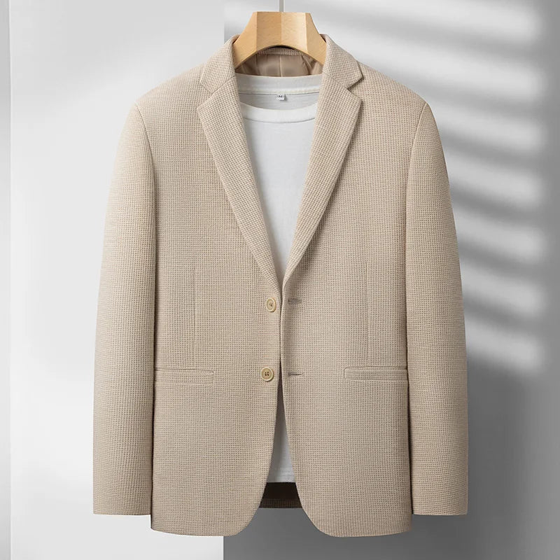 Gray men's tailored blazer, showcasing a perfect fit for sophisticated smart style and business casual attire.