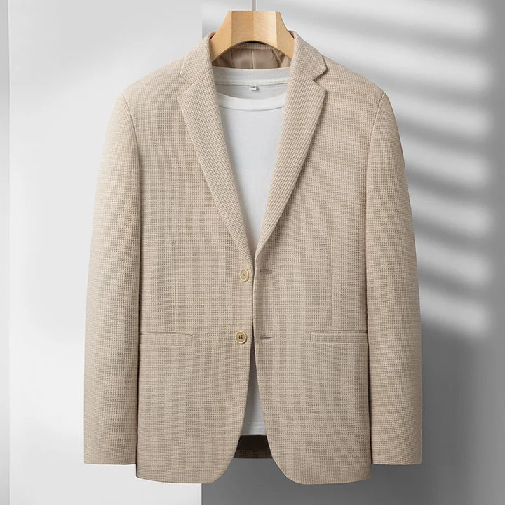 Gray men's tailored blazer, showcasing a perfect fit for sophisticated smart style and business casual attire.