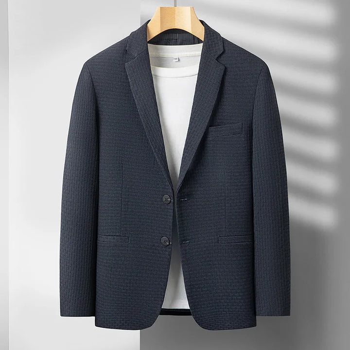 Blue men's tailored blazer, a versatile stylish coat for sophisticated warmth in business casual fashion.