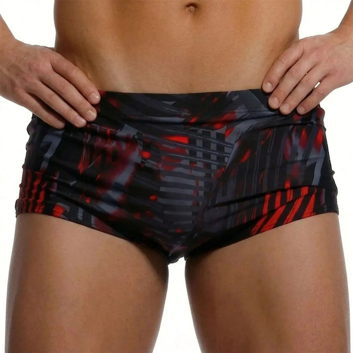 Vibrant patterned men's square cut swim trunks, excellent for active swim & vacation beachwear.