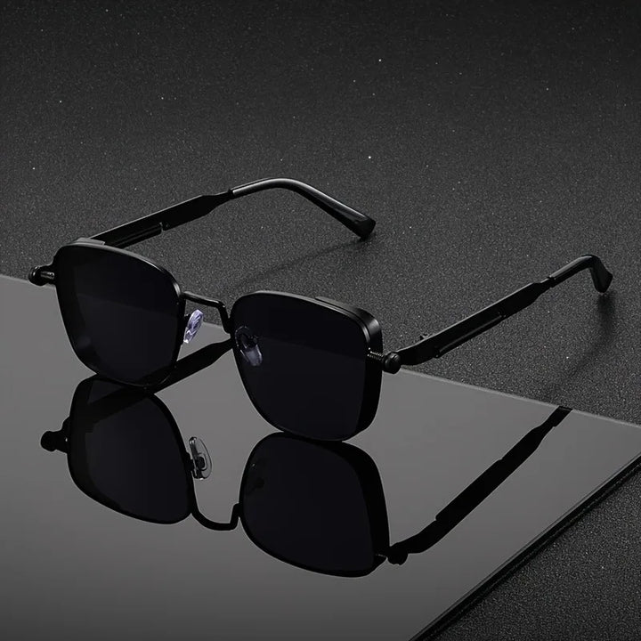 Black square frame men's sunglasses with UV400 protection. Anti-glare shades for a sleek, modern urban look.