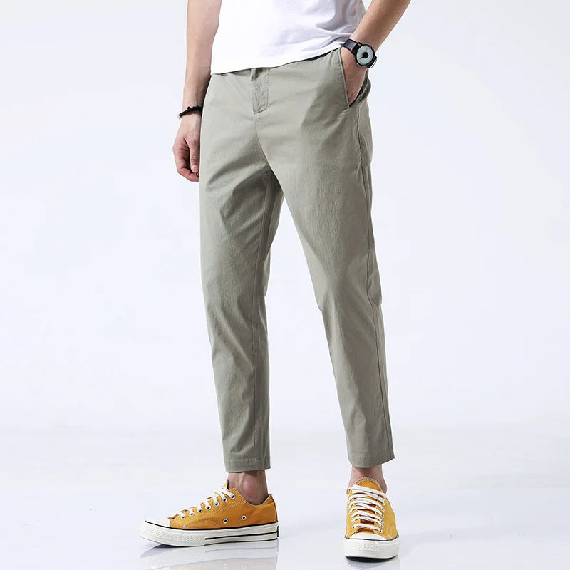 Comfortable men's straight fit cotton chinos; versatile for everyday casual and smart-casual outfits.