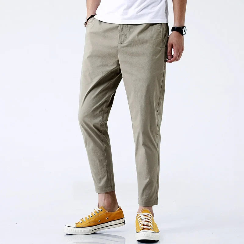 Versatile men's straight fit chinos for everyday wear; comfortable cotton pants for casual or semi-formal style.