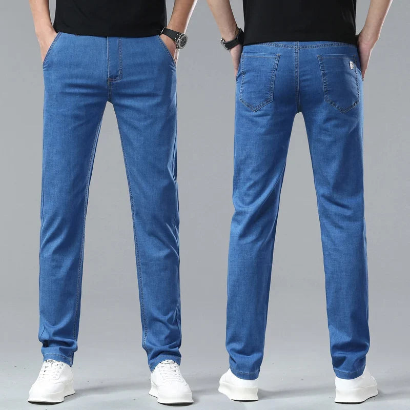 Stylish blue straight leg denim jeans for men, offering a modern, casual look.