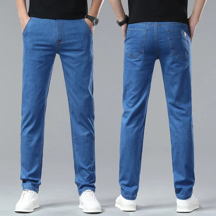 Stylish blue straight leg denim jeans for men, offering a modern, casual look.