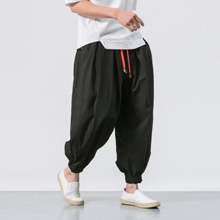 Stride men's baggy harem joggers with adjustable drawstring waist, ideal for relaxed fit comfort.