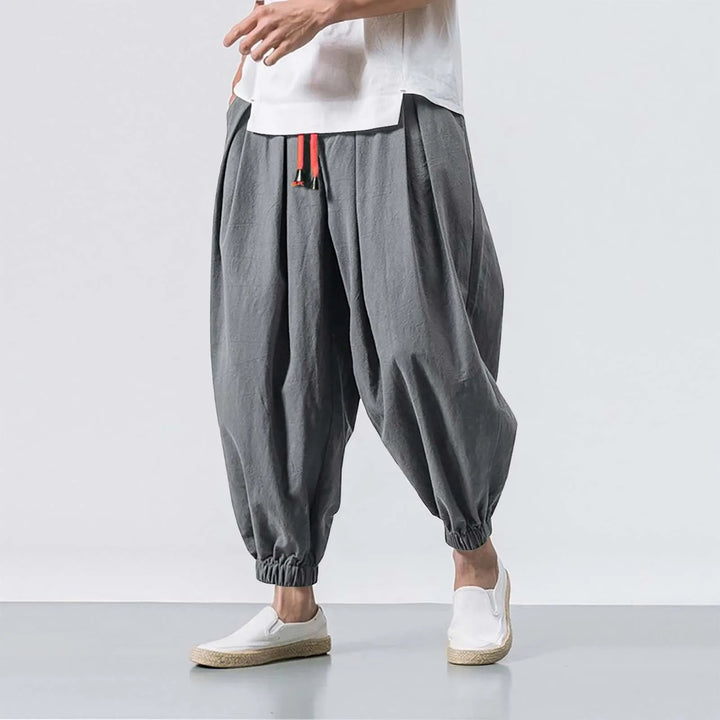 Versatile Stride men's baggy harem joggers, suitable for casual wear, yoga, activewear, or comfortable lounging.