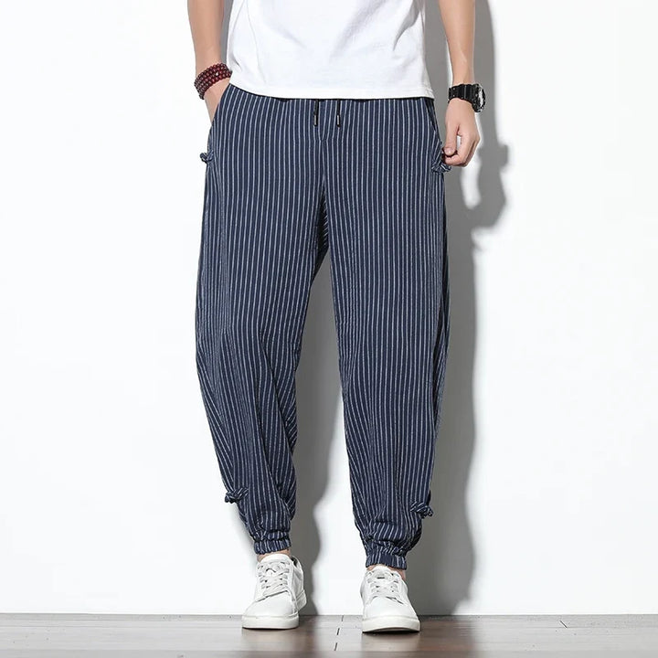 Stylish men's striped joggers, combining comfort and a modern athletic aesthetic for daily wear.