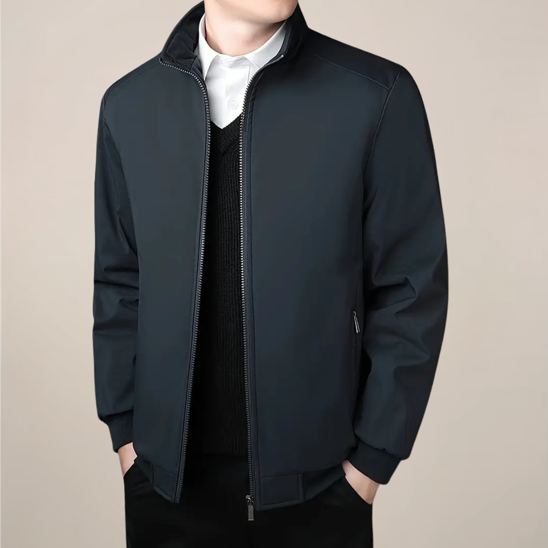 Men's warm lined winter jacket with a stand collar, stylish zip-up thermal coat for cold weather.