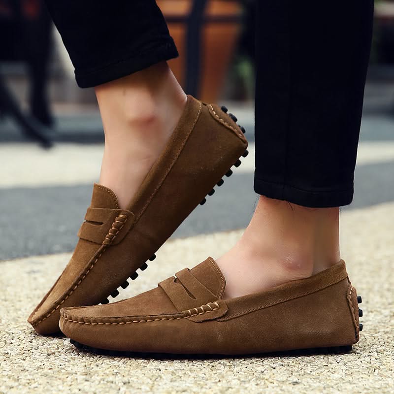 Front view of men's elegant slip-on loafers, perfect as stylish dress shoes or comfortable casual footwear.