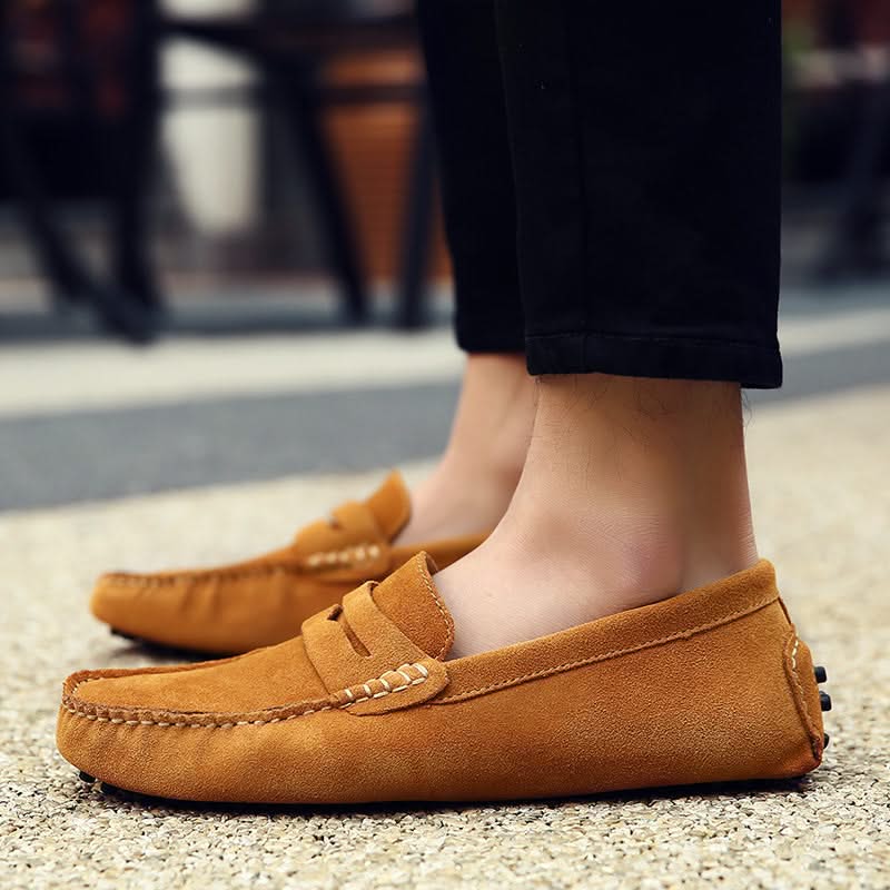 Classic brown men's slip-on loafers, ultimate comfort for sophisticated casual or formal dress.