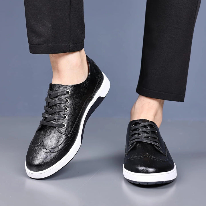 Premium leather men's brogue sneakers in navy blue, ideal for everyday stylish comfort & men's fashion.