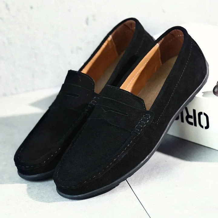 Casual navy men's loafers, comfortable slip-on shoes for relaxed style.