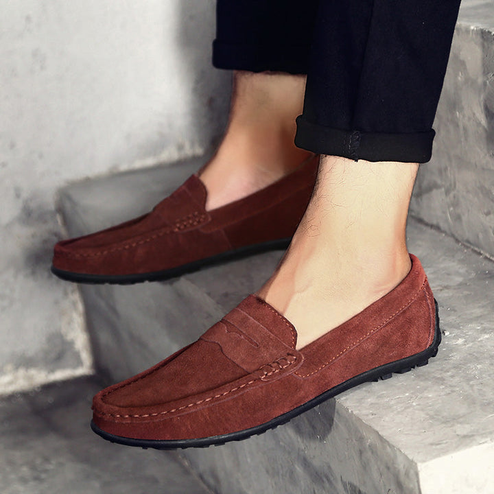Formal black slip-on loafers for men, offering style and comfort for events.