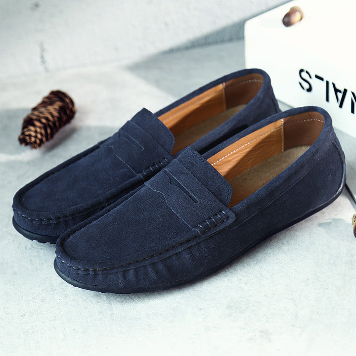 Men's comfortable slip-on shoes, stylish black loafers for casual and formal looks.