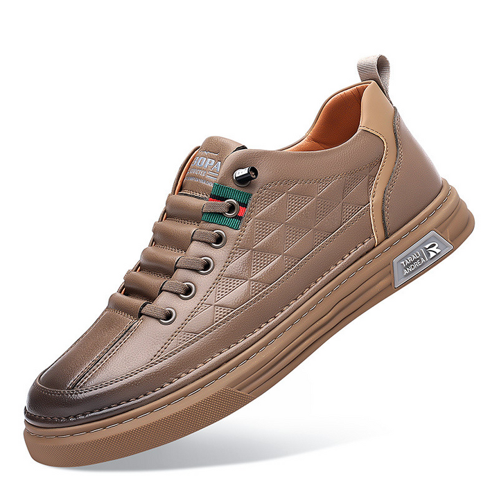 Versatile men's footwear: casual sneakers with an embossed design for comfort and contemporary style.