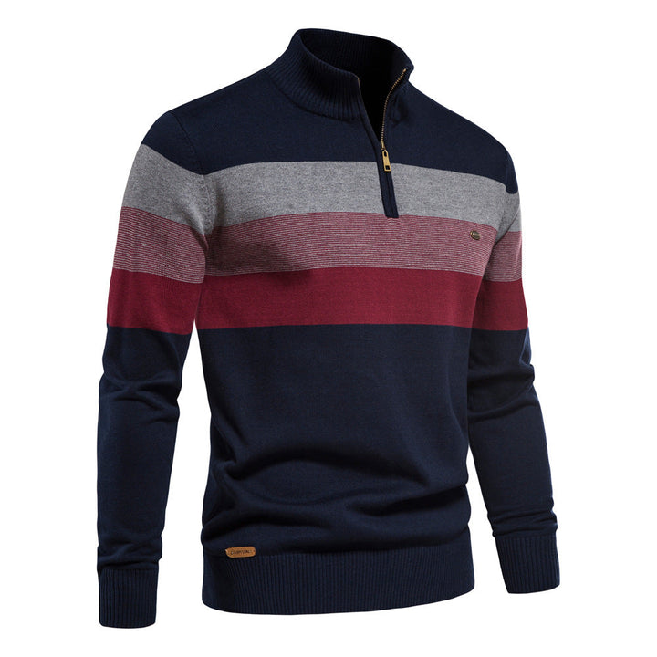 Modern men's fashion half-zip colorblock sweater, ideal for sophisticated layering.