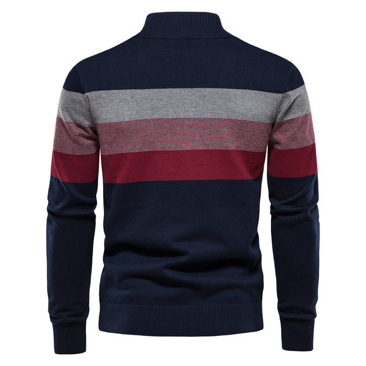 Comfort fit men's long sleeve colorblock pullover, stylish half-zip for casual wear.