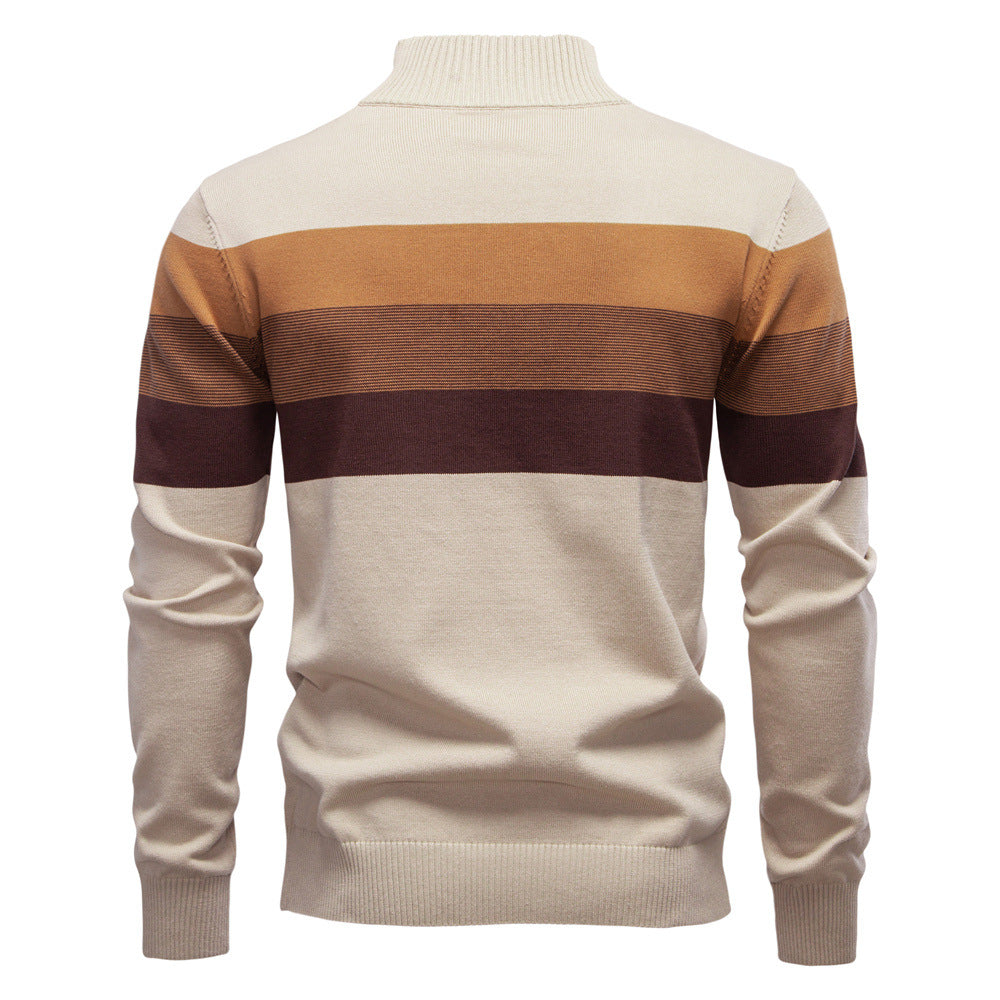 Stylish men's half-zip pullover with a distinctive colorblock pattern, for fall fashion.