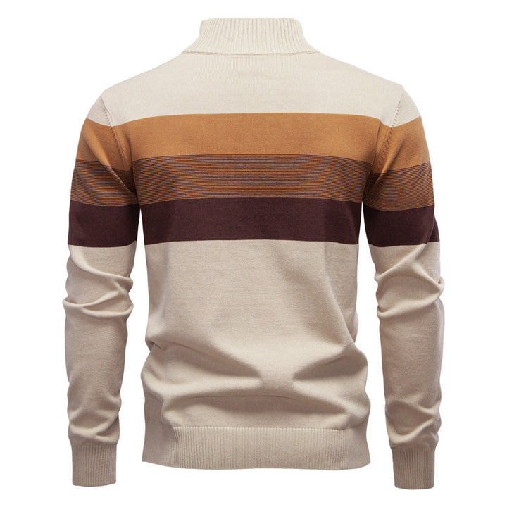 Stylish men's half-zip pullover with a distinctive colorblock pattern, for fall fashion.